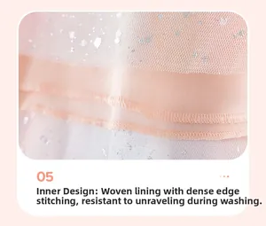 Close-up of pink mesh dress lining showing durable stitching and high-quality woven fabric