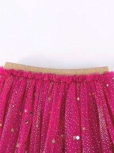 Girls fuchsia tutu skirt with gold sequins and elastic waistband for summer parties