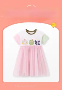 Detail of girls' summer dress with cartoon cat print and multi-layer pink tulle skirt
