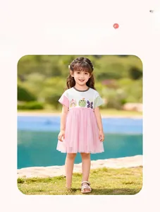 Detail of short sleeve mesh princess dress for girls with cat and apple graphics