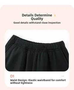 Detail view of boys' cotton knit shorts showing the elastic waistband and neat stitching
