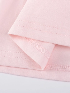 Pink cotton dress for girls featuring premium double-needle stitching on the hem and cuff