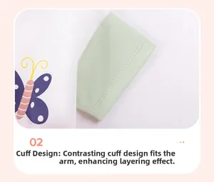 Close-up of contrast cuff design on soft cotton dress with delicate butterfly print
