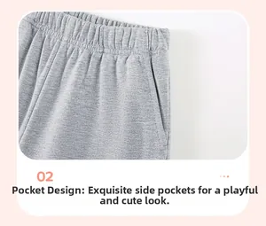 Close-up of boys' cotton shorts featuring elastic waistband and functional side pockets