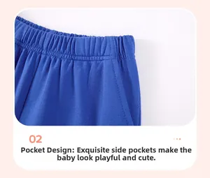Close-up of boys' blue cotton shorts featuring an elastic waistband and side pockets