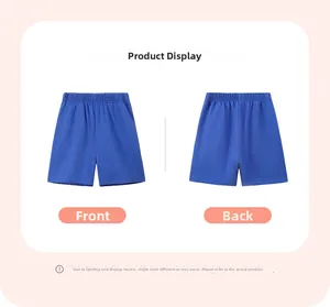 Detail view of royal blue cotton boys shorts featuring elastic waist and side pockets