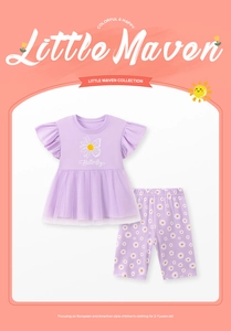 Close-up of lilac girl's summer outfit with daisy print and ruffled sleeve details