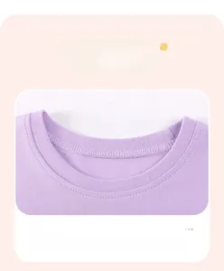 Detail of purple cotton knit round neck with durable ribbed collar and fine stitching