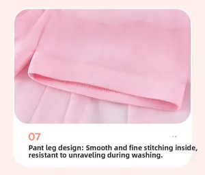 Détail de l'ourlet de jupe en tulle rose montrant la doublure et les coutures soignées