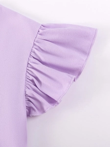 Short sleeve purple girls' outfit featuring detailed ruffle sleeves and soft knit fabric