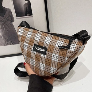 Brown and white plaid crossbody fanny pack with adjustable strap and fashion label