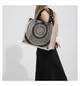 Detail of transparent PVC tote bag with mandala pattern and rustic hemp side stitching