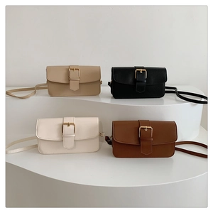 Detail showing vintage small square crossbody bags in beige, black, white, and brown