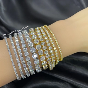 Moissanite tennis bracelets in various widths from 2mm to 6.5mm on black silk