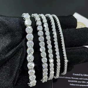Four sizes of S925 sterling silver moissanite tennis bracelets on black background