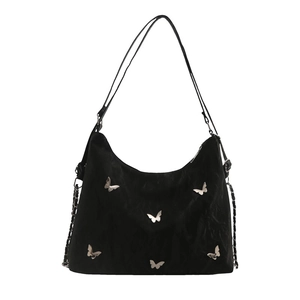 Black crescent shoulder bag with silver butterfly charms and adjustable chain strap