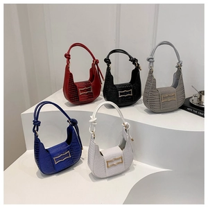 Selection of five hobo bags in crocodile texture with gold buckle and knot details