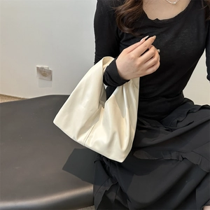 Minimalist cream white pleated leather bucket bag for women commute and casual style