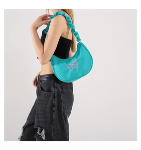 Detail of hobo bag with pink butterfly embroidery and scrunchie shoulder strap