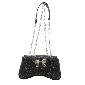 Elegant black sequin chain bag with a silver metal bow and curved bottom design