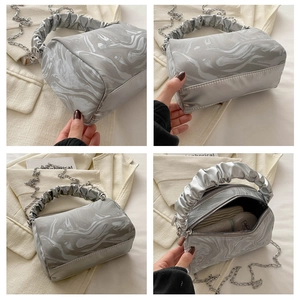 Multi-angle view of silver marble textured handbag with ruched handle and chain