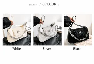 Detaillierter Vergleich schicker Achseltaschen in Weiß, Silber und Schwarz mit Schmetterling