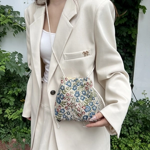 Ethnic style floral embroidery canvas bucket bag with woven drawstring for women
