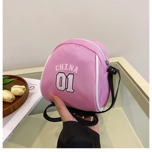 Pink canvas mini crossbody bag with CHINA 01 text and adjustable black shoulder strap