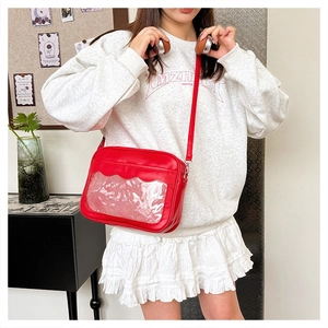 Borsa ita in pelle rossa con finestra in PVC trasparente e bordi ondulati a tracolla