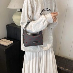Sac à main chic gris foncé avec pois rouges et poignée pour la mode féminine moderne