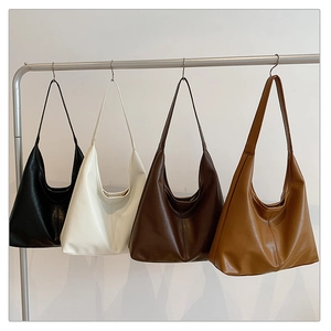 Detailed comparison of minimalist leather tote bags in black, white, brown and tan colors