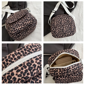 Detailed views of leopard print crossbody bag showing interior capacity and zipper details