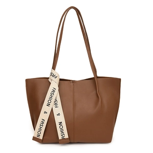 Brown leather tote bag with stylish cream fashion ribbon and large capacity design
