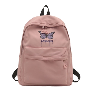 Pink school backpack for girls with purple butterfly print and Dreams text design