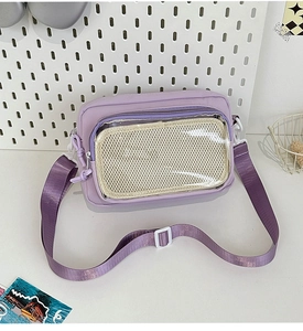 Detail view of purple nylon crossbody bag with transparent window for badge display