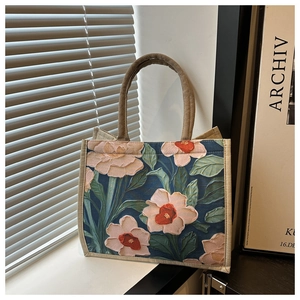 Artistic oil painting floral print detail on a sturdy canvas tote bag for women
