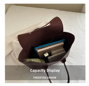 Interior view showing the large capacity for tablet, wallet, and essentials in this tote