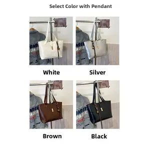 Chic tote bag color options in white, silver, brown and black with decorative charms