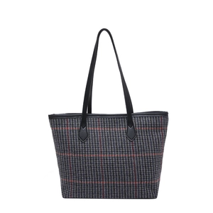 Large glen plaid tote bag with black leather straps and red accents on white background