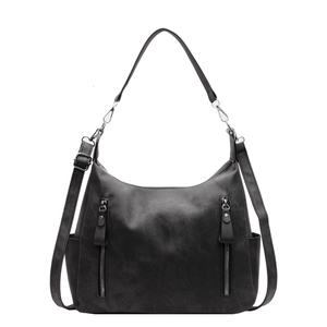 Large black matte faux leather tote bag with multi-zipper pockets and shoulder strap