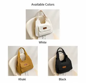 Tre grandi borse tote in tela nei colori bianco, kaki e nero per uno stile casual