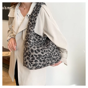 Close-up of leopard print faux fur tote bag with soft plush texture and large capacity
