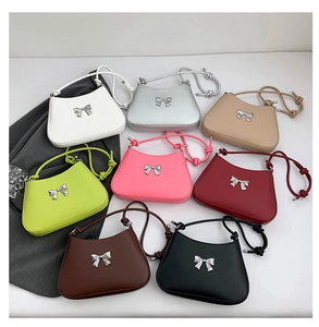 Top view of minimalist PU leather shoulder bags with bow decoration in eight colors