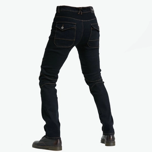 Rear view of dark blue motorcycle jeans with accordion stretch panels and buttoned pockets