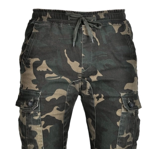 Detail of camouflage riding pants showing elastic waist with drawstring and cargo pockets