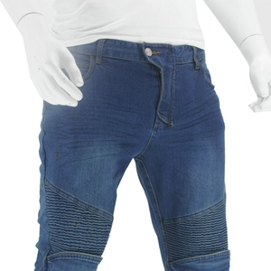 Detail of blue biker denim jeans with pleated knee panels on male mannequin