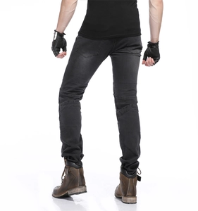 Detail of grey slim motorcycle jeans with reinforced knee pleats and back pockets
