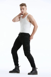 Detail of high-stretch motorcycle jeans with pleated knee pads and contrast stitching