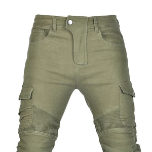 Detail of army green biker pants with cargo pockets and pleated stretch panels