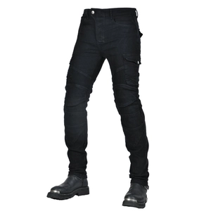 Detail of black motorcycle jeans with accordion stretch panels and tactical cargo pockets